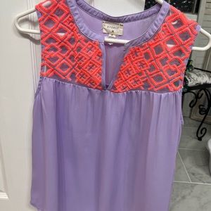 Purple with pink embroidery details around neck